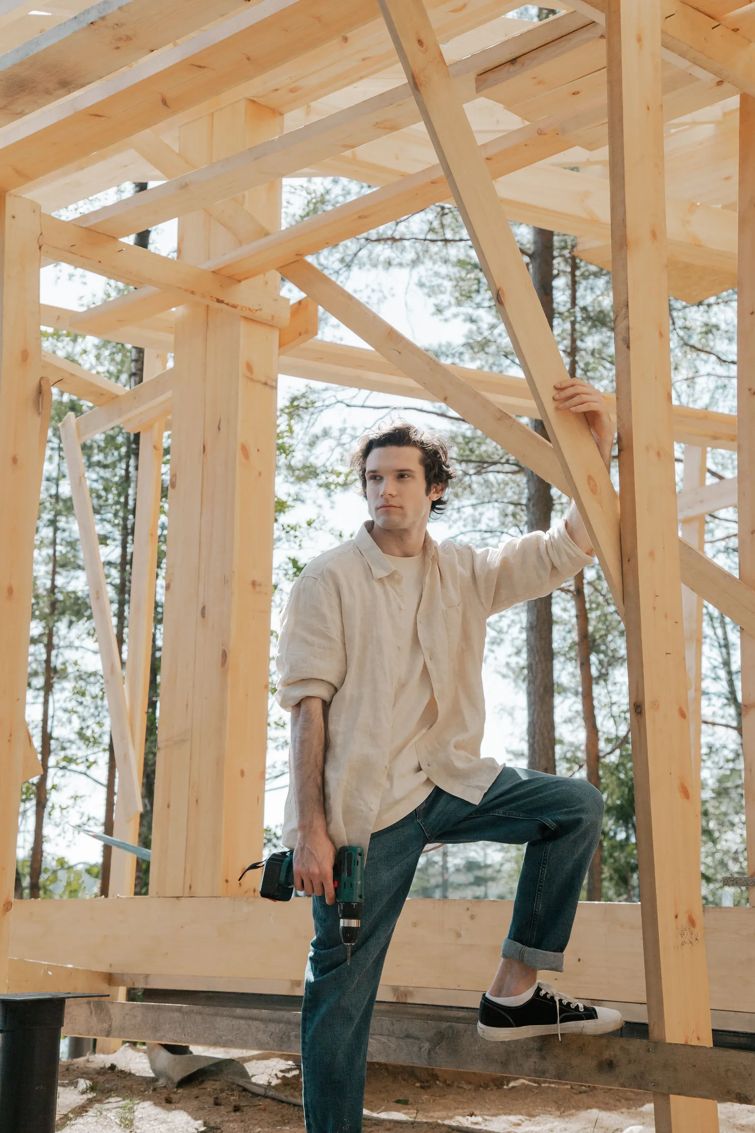 Builder at a timber construction site